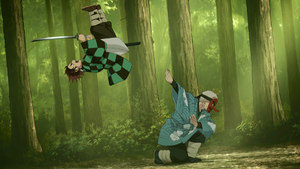 Sakonji beating Tanjiro in combat