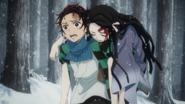 Tanjiro carrying a wounded Nezuko.png
